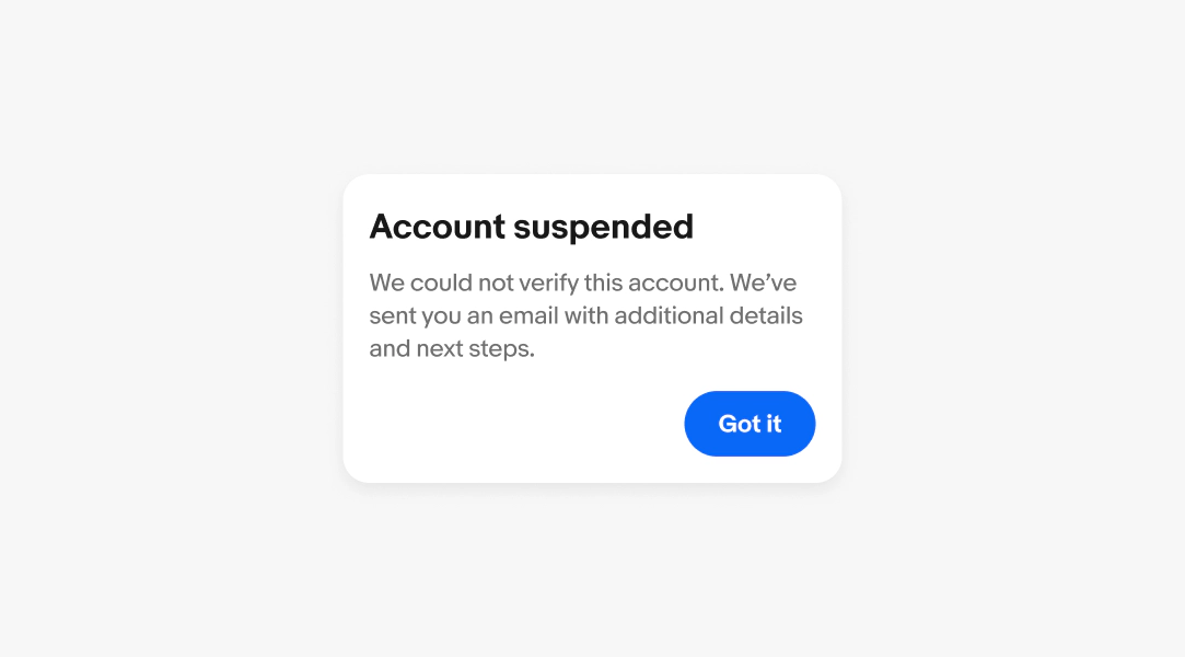 Alert dialog box with a title of "Account suspended", a body of "We could not verify this account. We’ve sent you an email with additional details and next steps." and "got it" button.