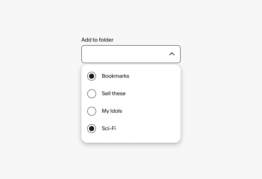 Add to folder dropdown with checkboxes; Bookmarks and Sci‑Fi selected; divider above footer actions View all folders and Help.