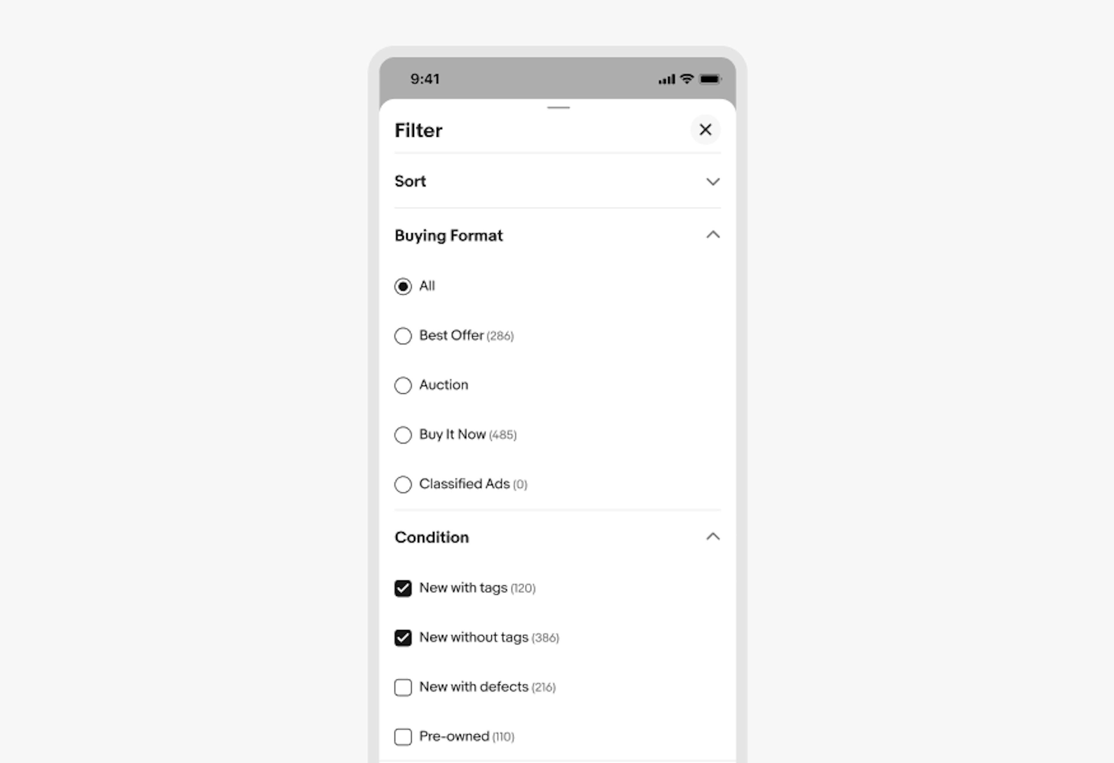 Mobile filter panel with two expanded sections. Buying Format shows radio buttons with All selected, and options for Best Offer, Auction, Buy It Now, and Classified Ads. Condition shows New with tags and New without tags selected checkbox, and New with defects and Pre-owned unchecked.