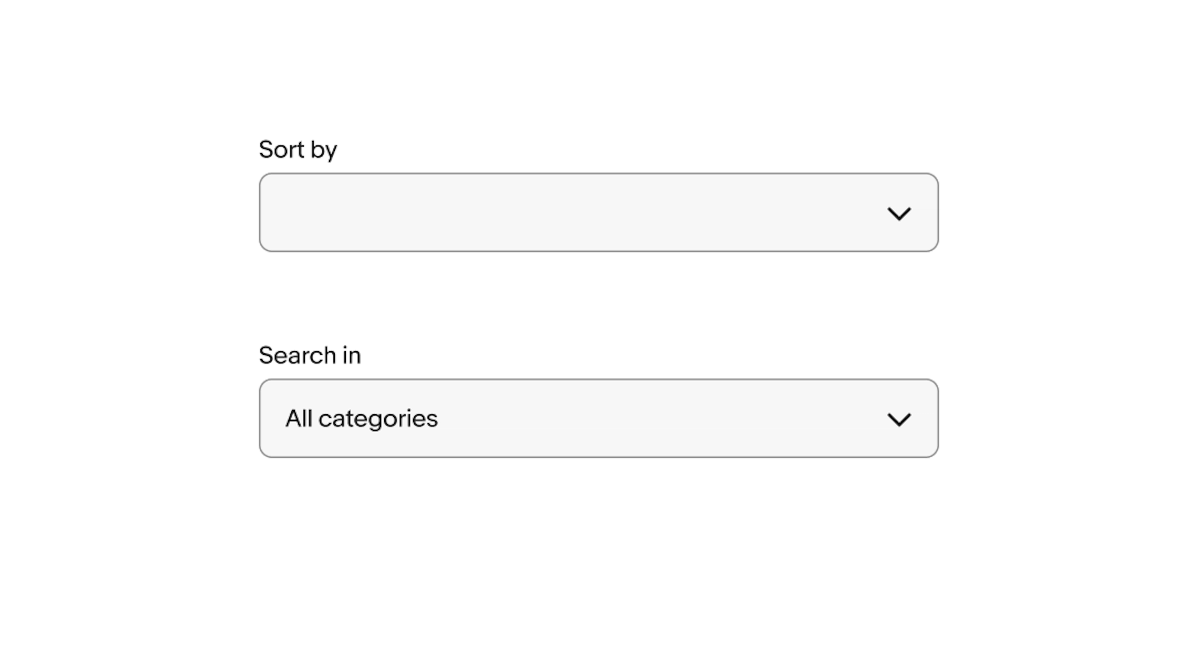 Two select lists. One showing an empty value and one showing a pre-selected value. 