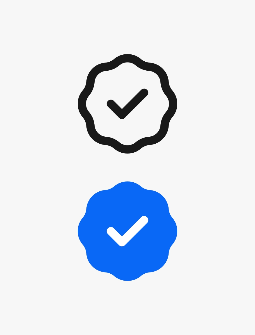 Two stacked Authenticity badges. The top is black outlined and the bottom is blue filled.