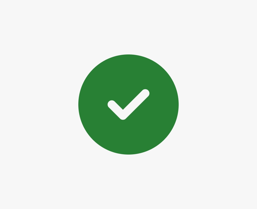 A green filled circle icon with a white checkmark.