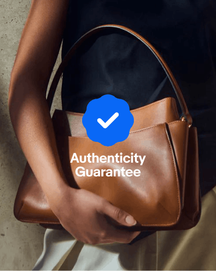 A full bleed image of a woman holding a brown handbag with a full logo Authenticity Guarantee with a blue filled icon in the center.