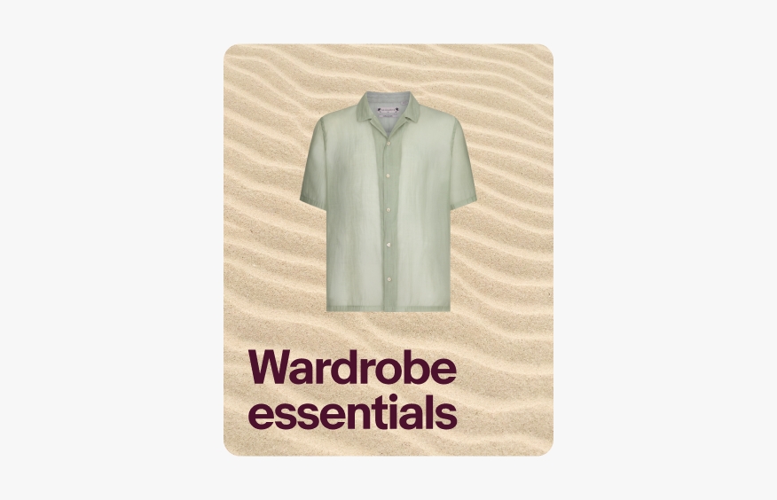 A slide with a drifting sand background and a cutout image of a light green button down shirt.