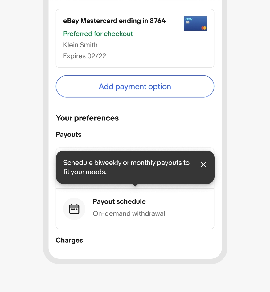 A tourtip sits points to a ‘Payout schedule’ card on the eBay mobile app.