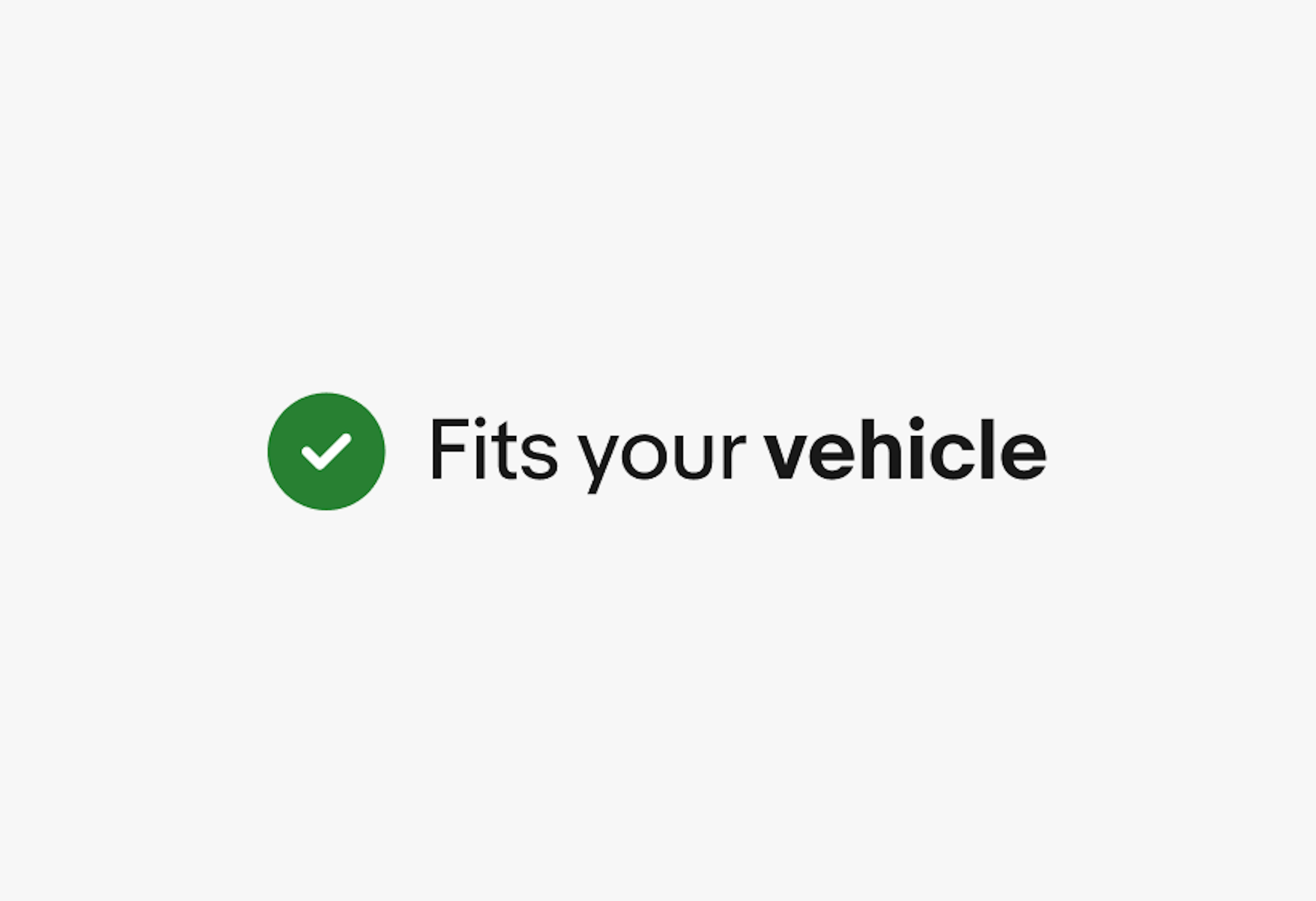 A green filled confirmation checkmark icon next to the text “Fits your vehicle”, but “vehicle” is bolded.