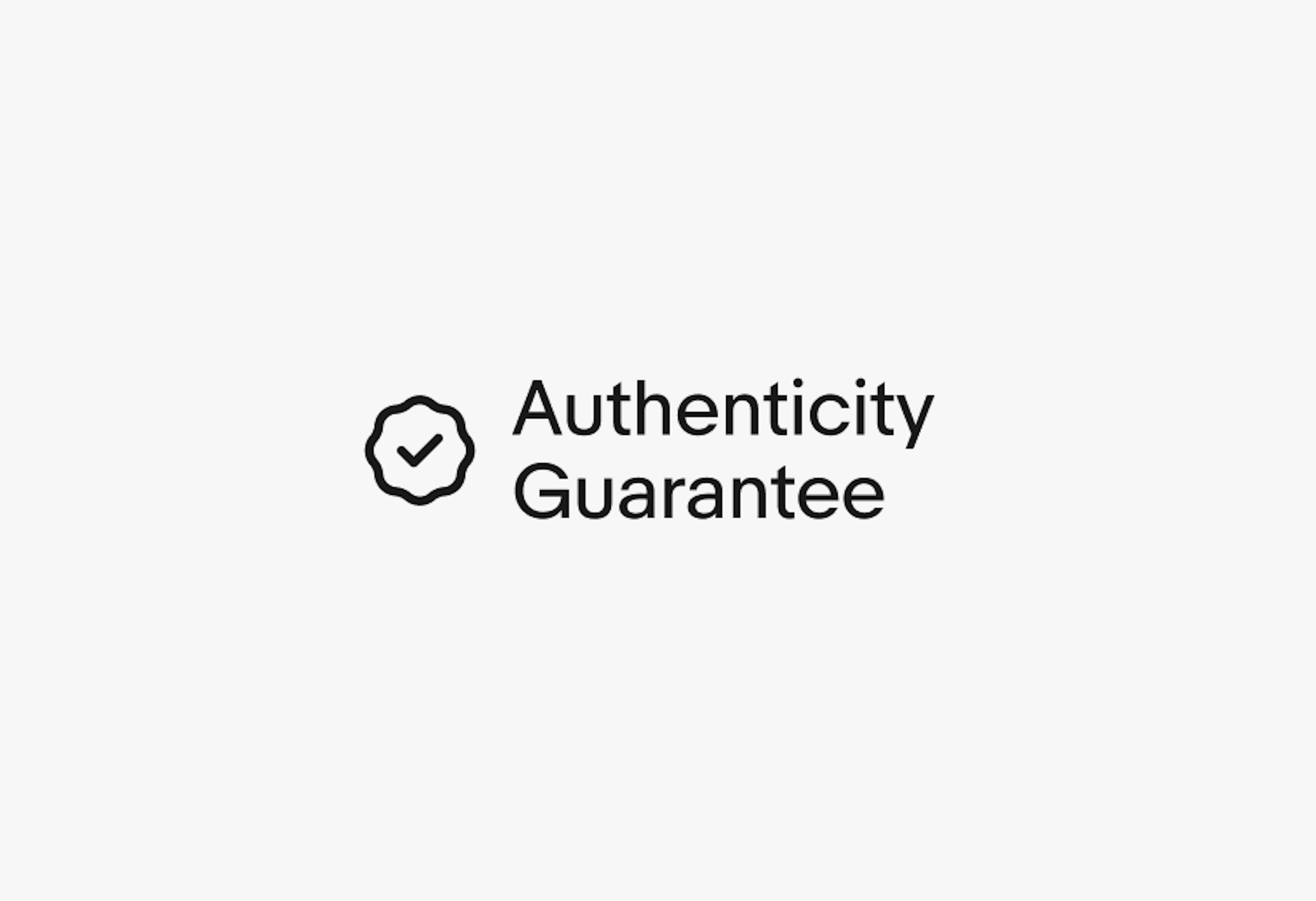 A double line program lockup for Authenticity Guarantee. The icon is small and to the left of two lines of text.