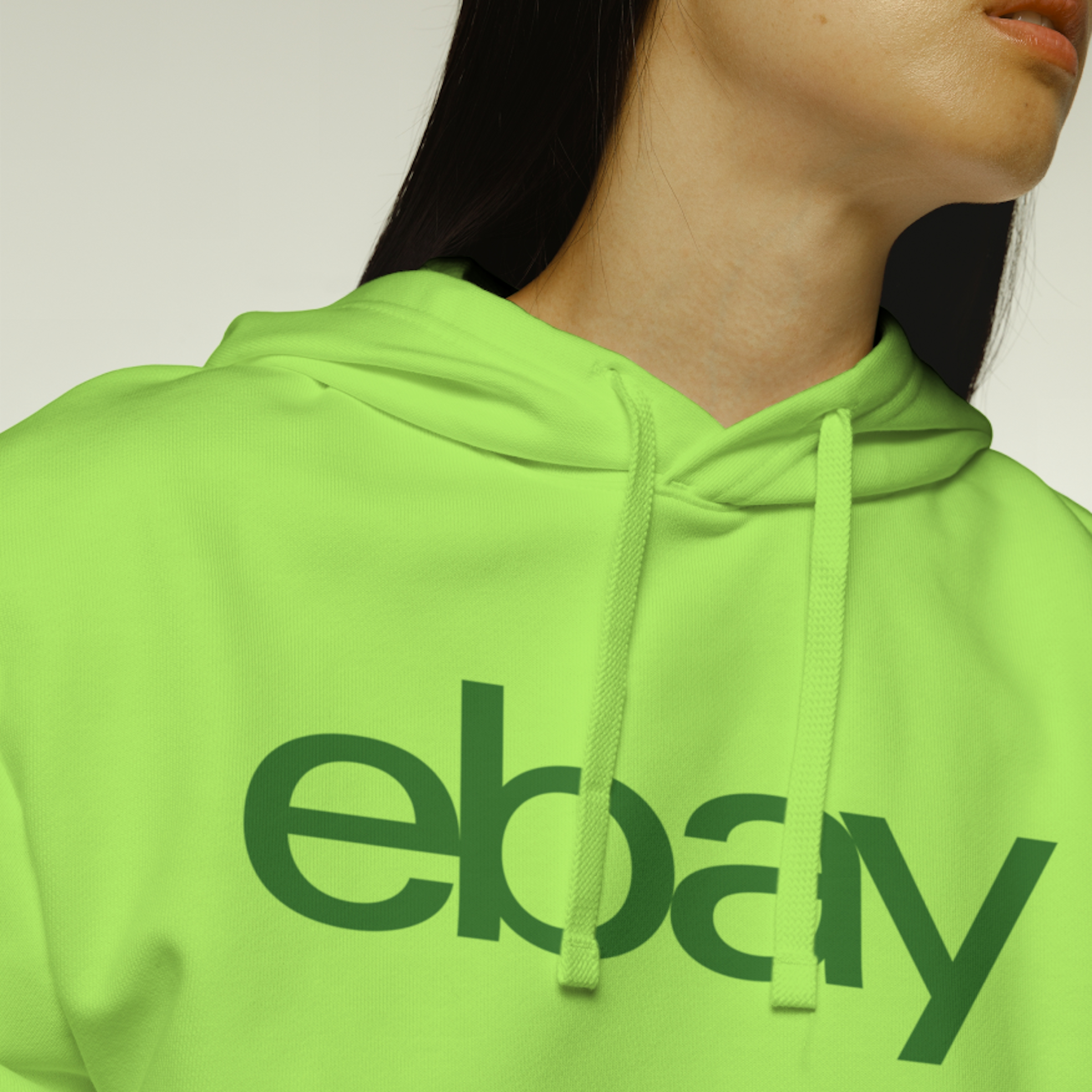 A dark green eBay logo on a neon green hoodie.