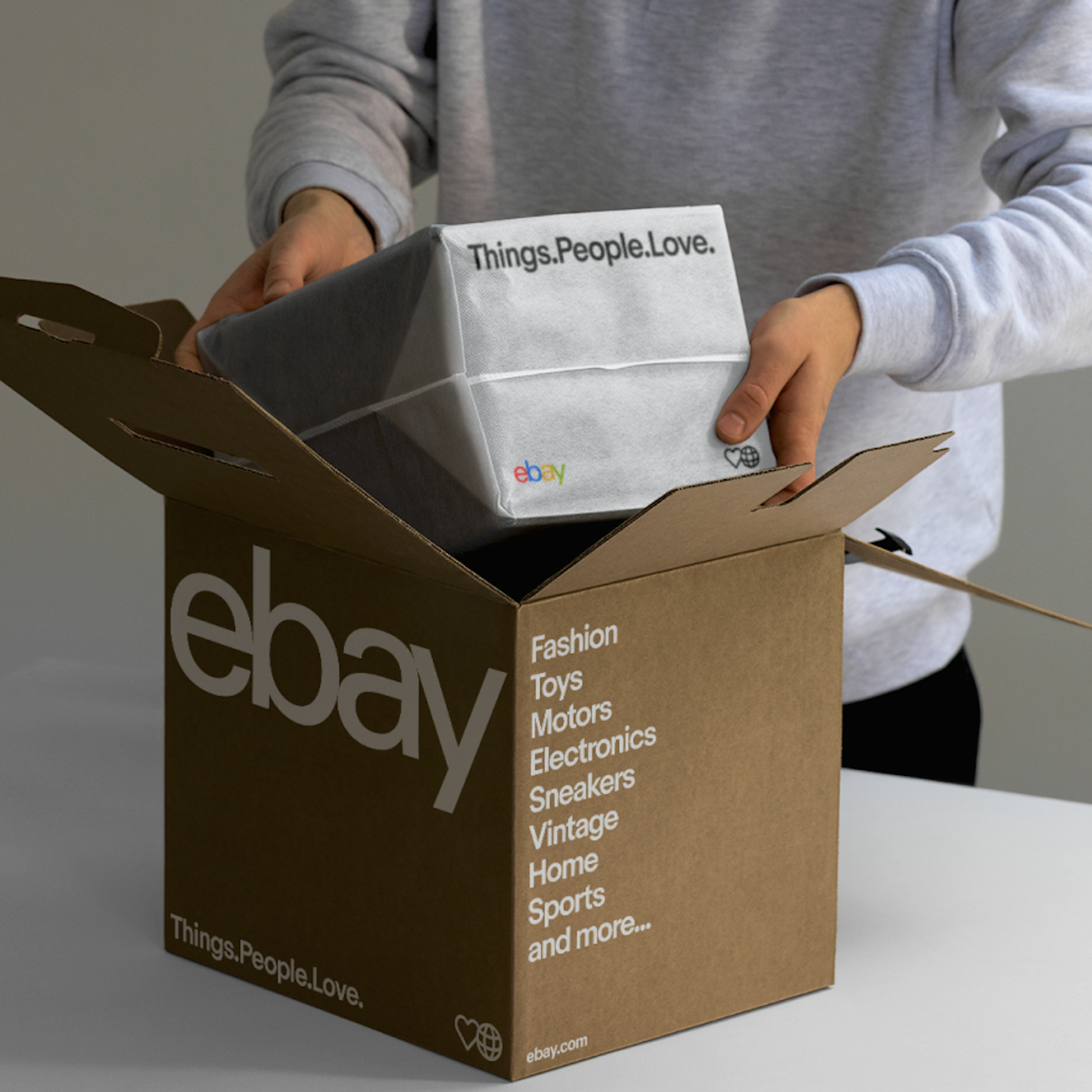 A large white logo and white text on a brown package.