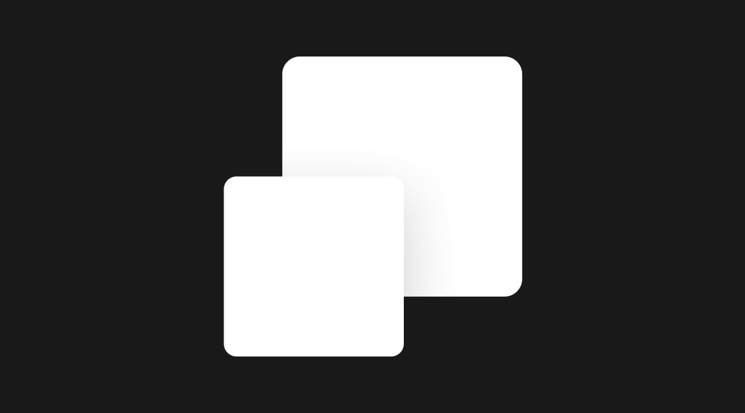 Two white cards stacked. The top, smaller card is overlapping the bottom left corner of the larger card. The top card has a shadow applied to show depth.