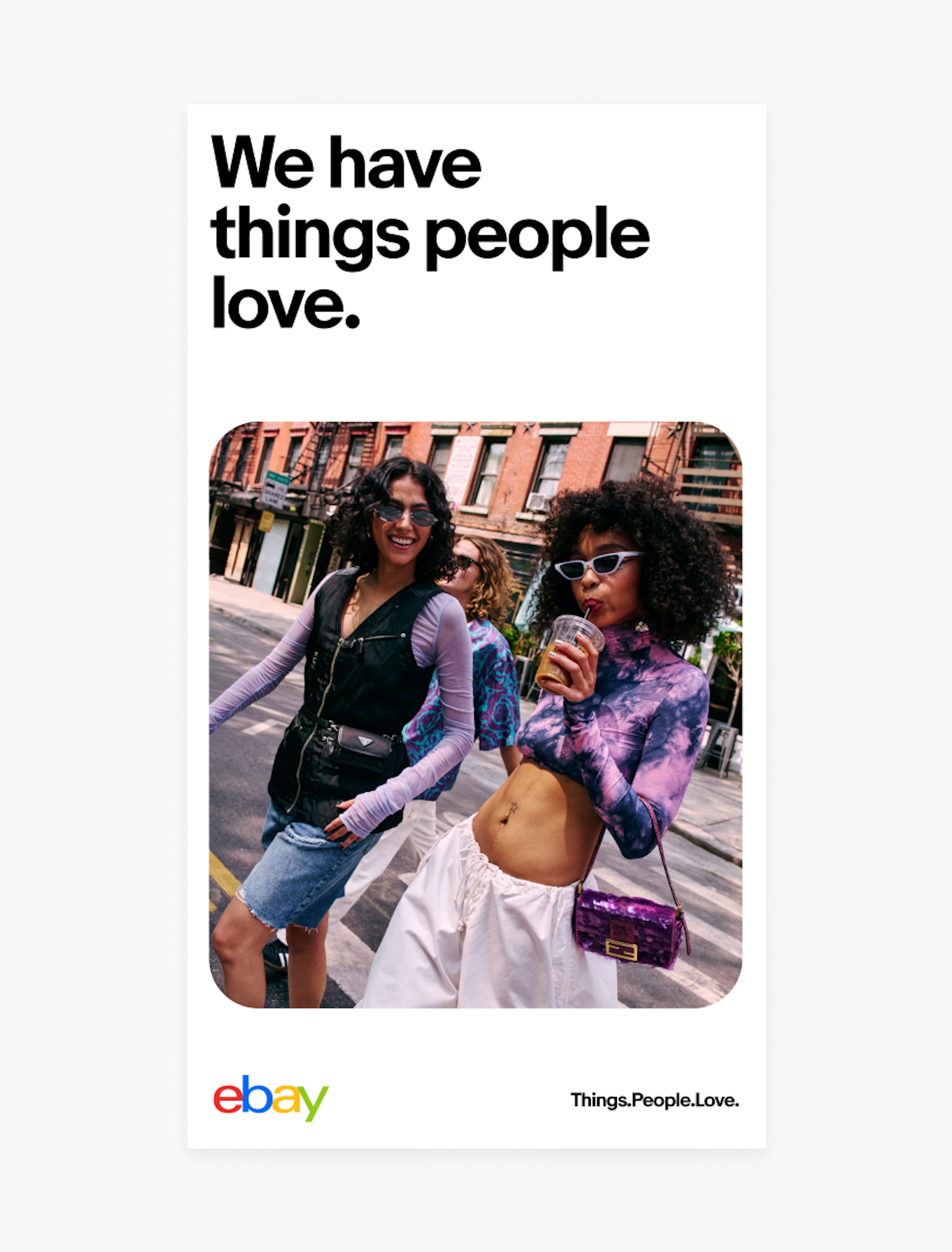 A vertical eBay ad with a white background. The title “We have things people love.” is in the upper left. The eBay logo is in the bottom left and tagline “Things.People.Love.” bottom right. A large image of two girls in colorful clothes fills the center.