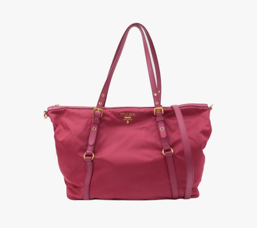 The image shows a pink Prada tote shot in bad lighting.