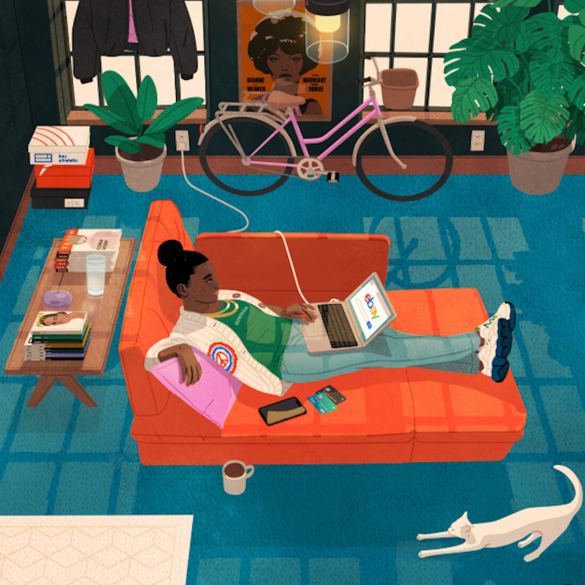 A person is lying on an orange sofa, using a laptop displaying the eBay website. The room includes a bicycle, plants, a white cat stretching on the floor, and a coffee table with books and a drink. There are shoe boxes in the corner and a poster on the wall in the background.