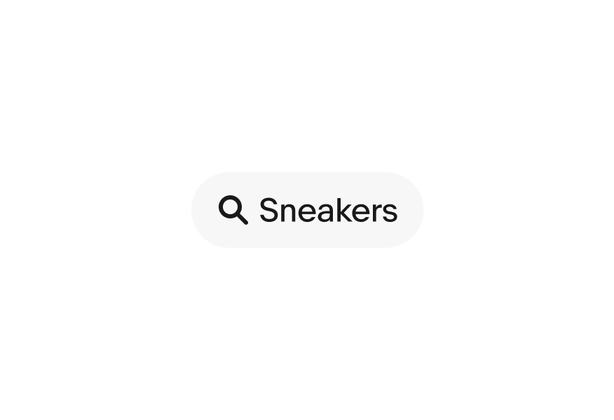 A filled ‘Sneakers’ UI Element with a search icon.