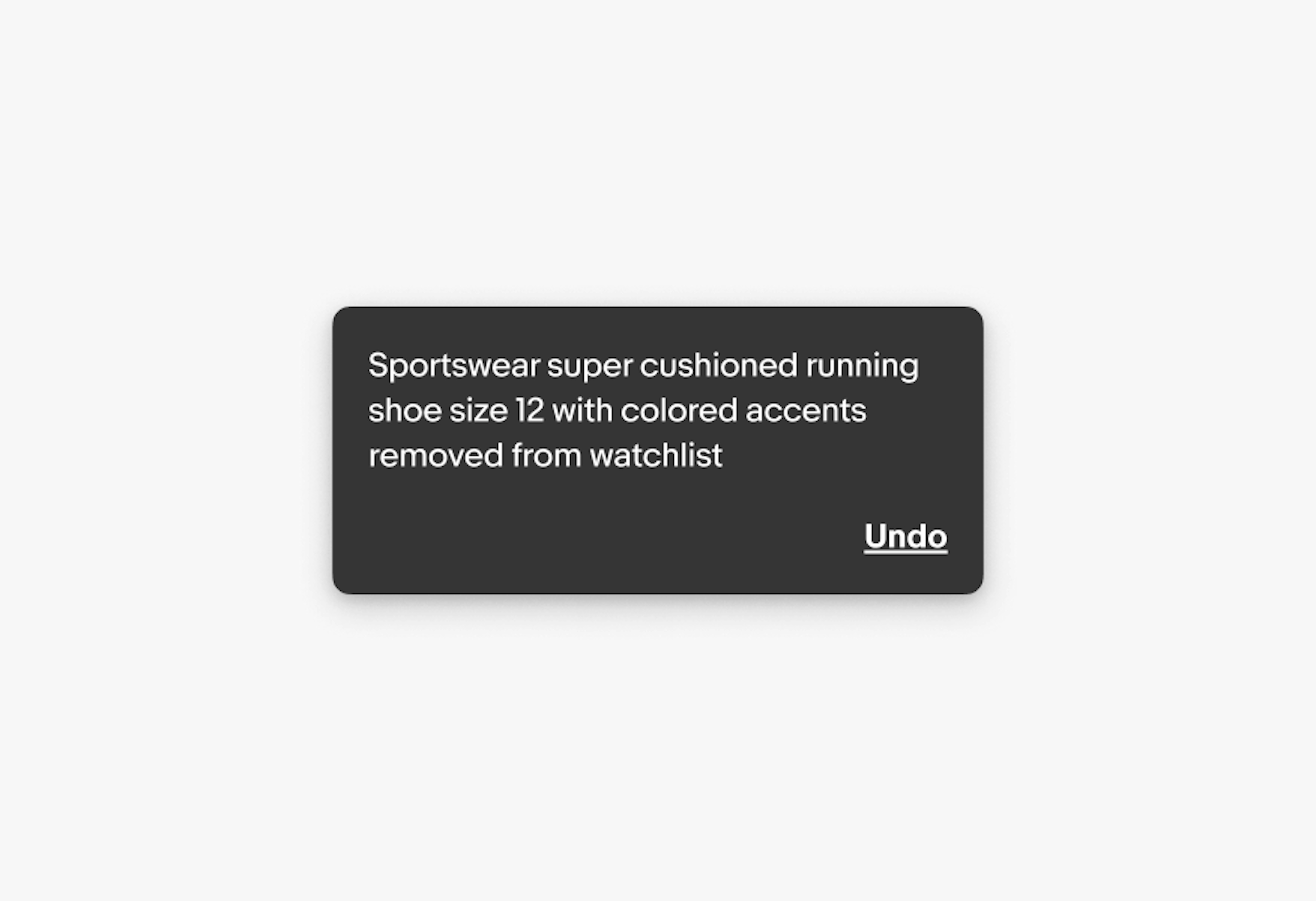 A snackbar with three lines of body copy “Sportswear super cushioned running shoe size 12 with colored accents removed from watchlist”.