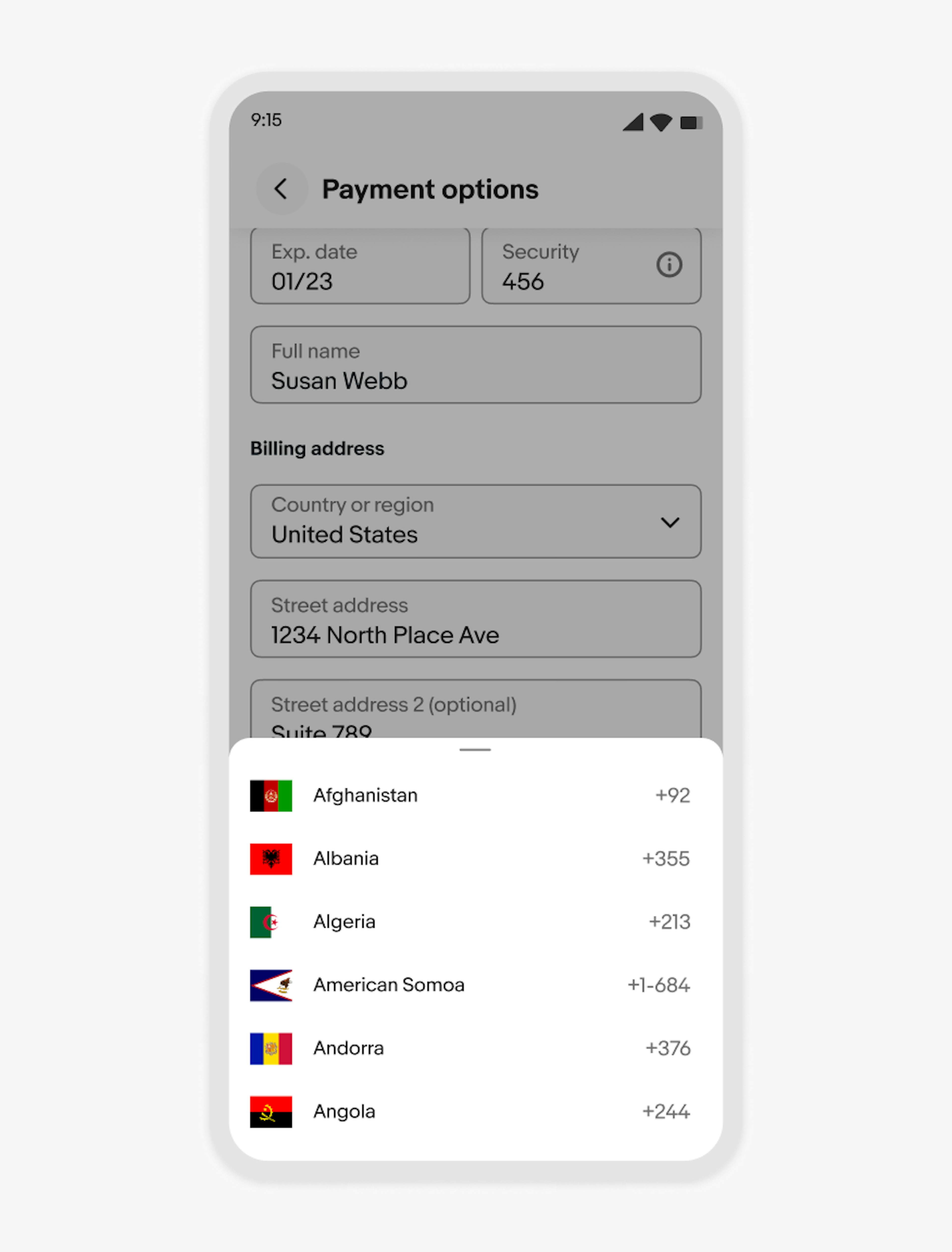 A bottom half sheet with a list of countries and country codes is shown on the eBay mobile app.