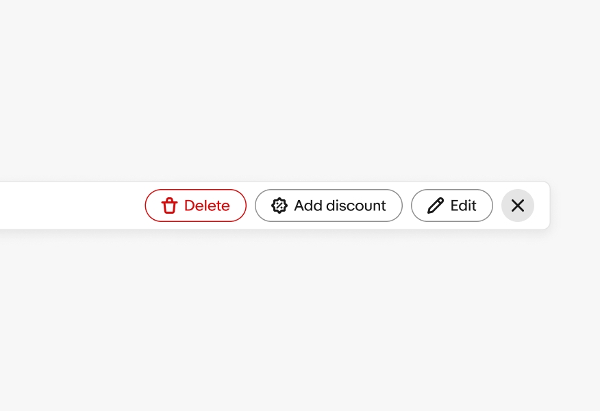 A ‘Delete’ action button, an ‘Add discount’ action button, and an ‘Edit’ action button on a bulk edit bar. The ‘Delete’ button is red.