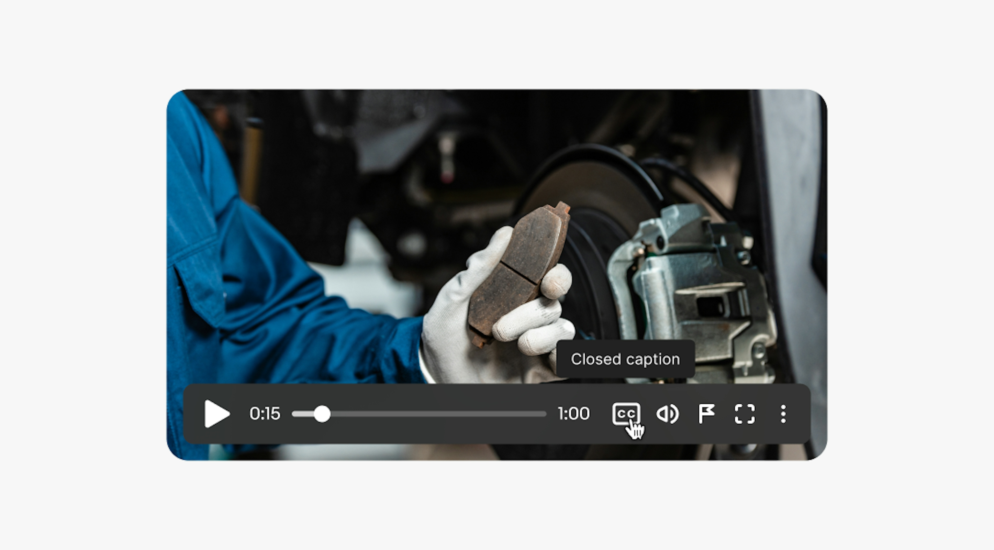 A cursor hovers over the closed caption icon with ‘Closed caption’ tooltip appearing above it.