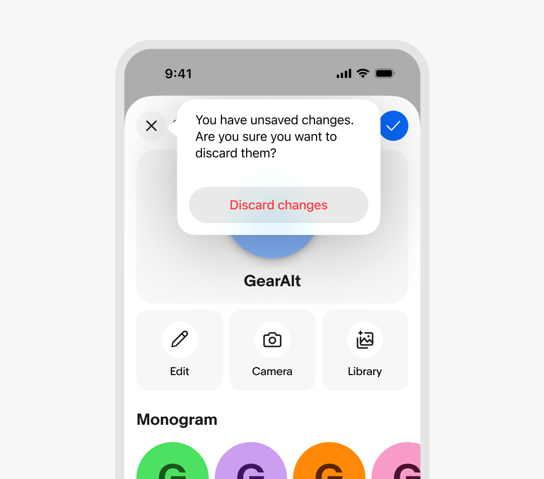 Example of an iOS context sheet presenting a popover from the sheet's close button. The popover warns that there are unsaved changes that will be lost and has a button that discards the unsaved changes. 