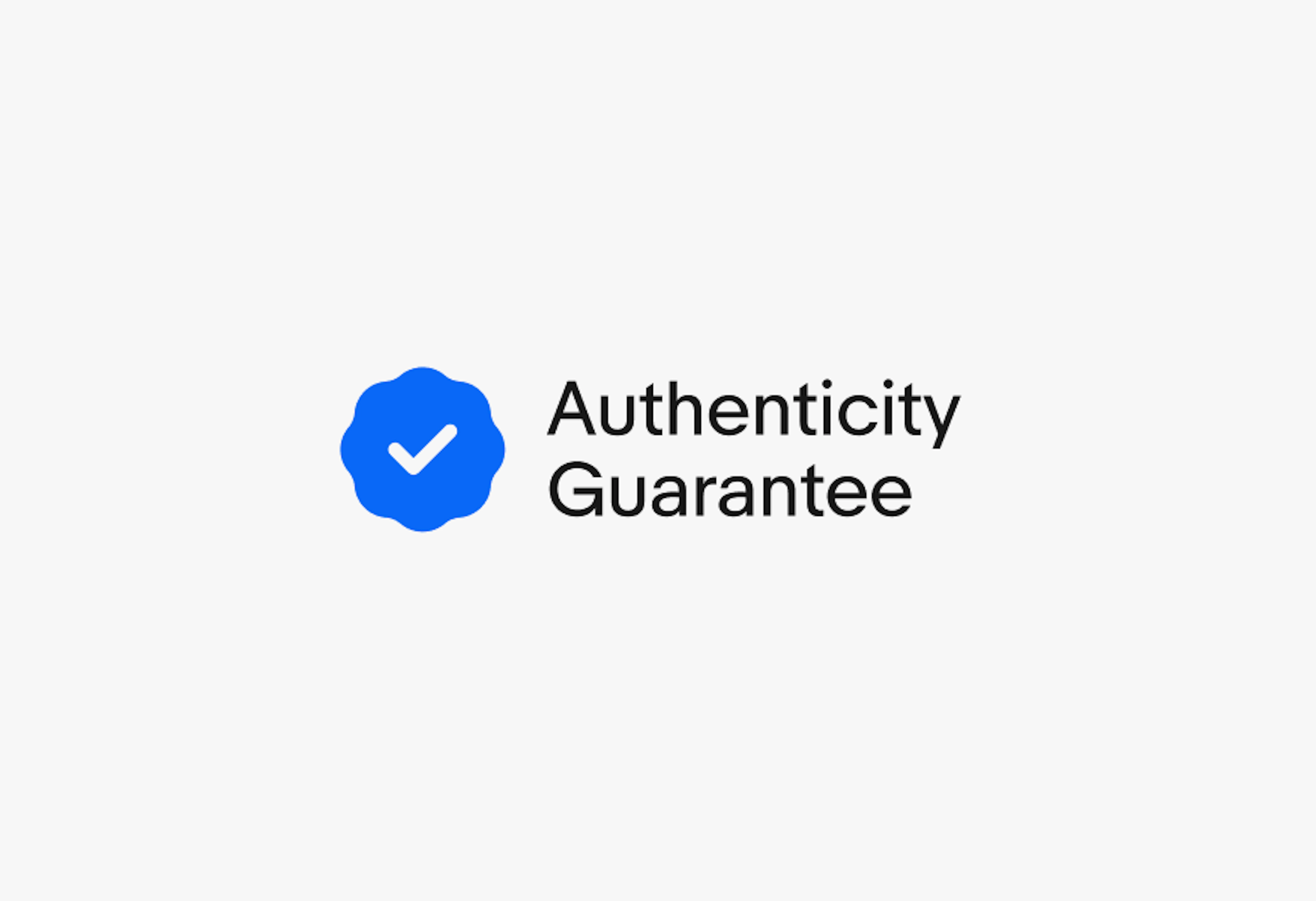 A rosette checkmark icon next to a double line of text. “Authenticity” is on the first line and “Guarantee” on the second.