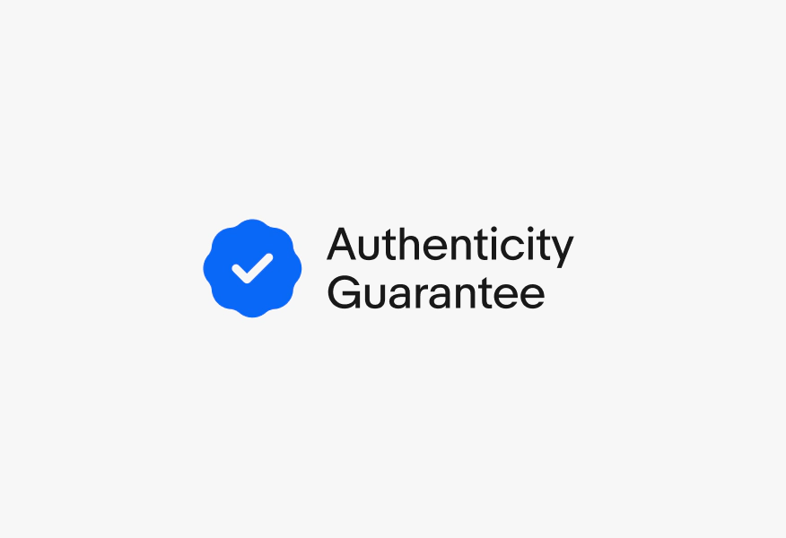 A rosette checkmark icon next to a double line of text. “Authenticity” is on the first line and “Guarantee” on the second.