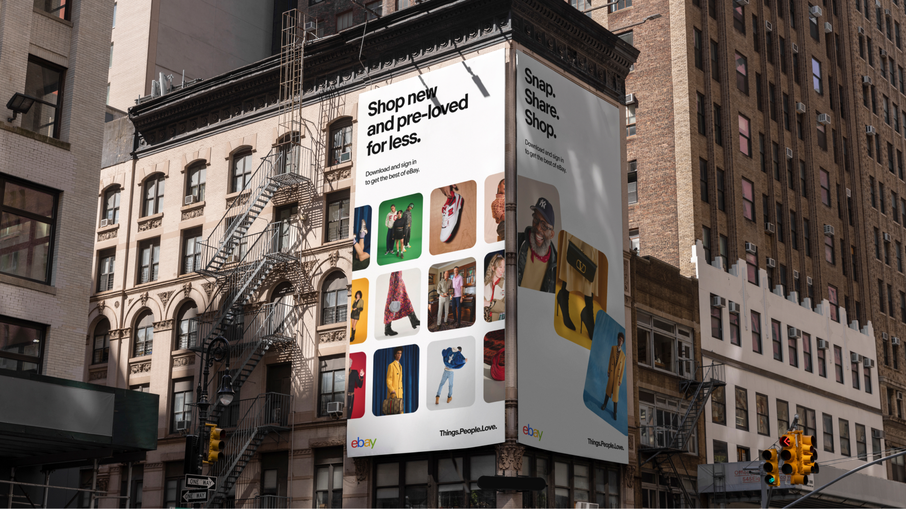 A large billboard advertisement on a building in a city promoting eBay with the text "Shop new and pre-loved for less" and "Snap. Share. Shop." The billboard features images of various products and people, encouraging viewers to download and sign in to the eBay app.