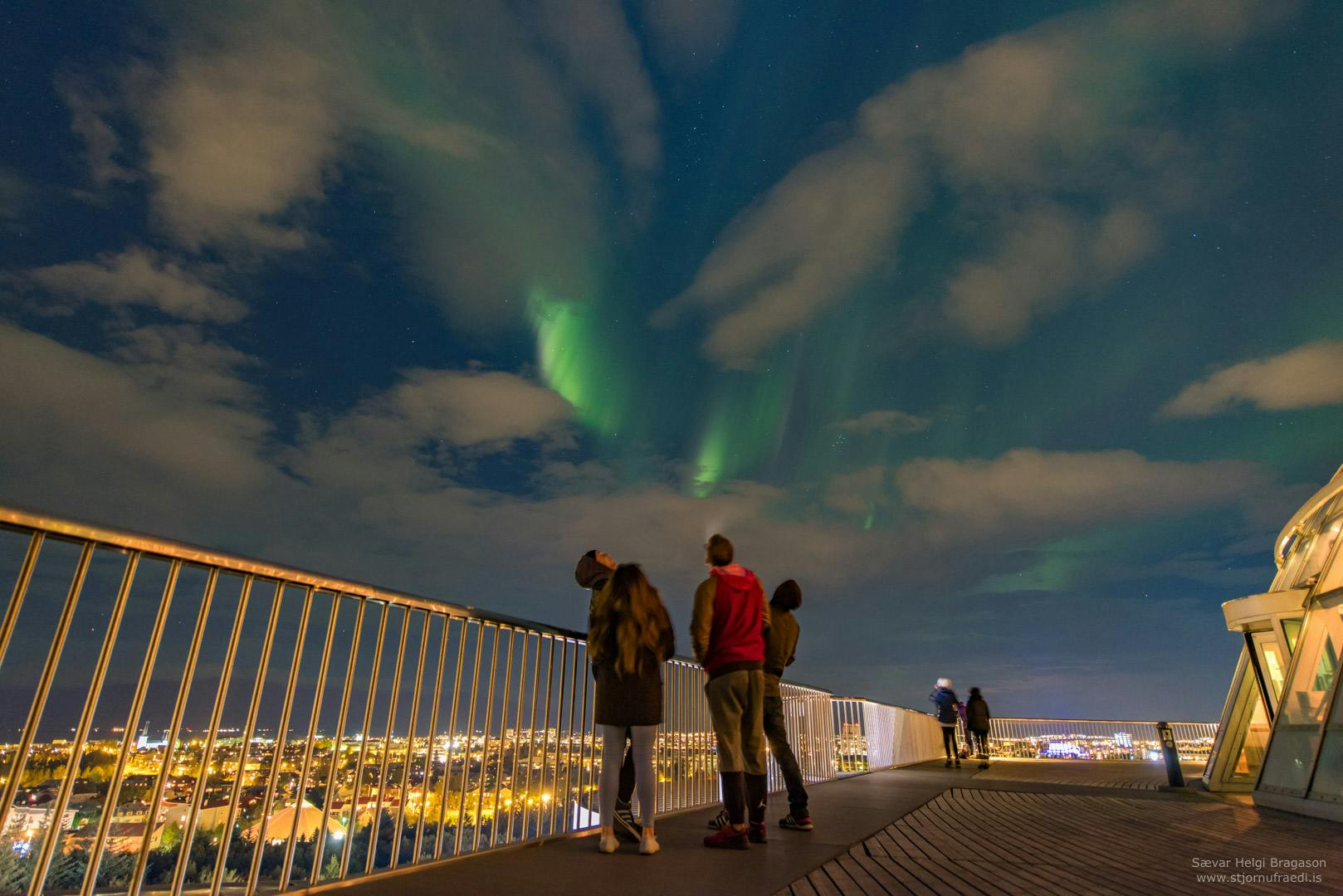 People watching Northern Lights at Perlan Museum in Reykjavík. Credit: Sævar Helgi Bragason