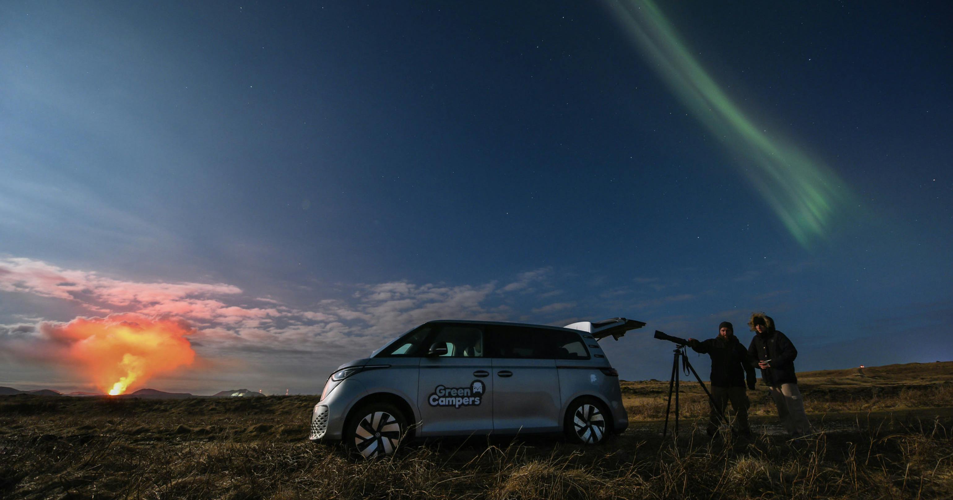 Electric car under Northern Lights and volcanic eruption. Credit: Gísli Már Árnason