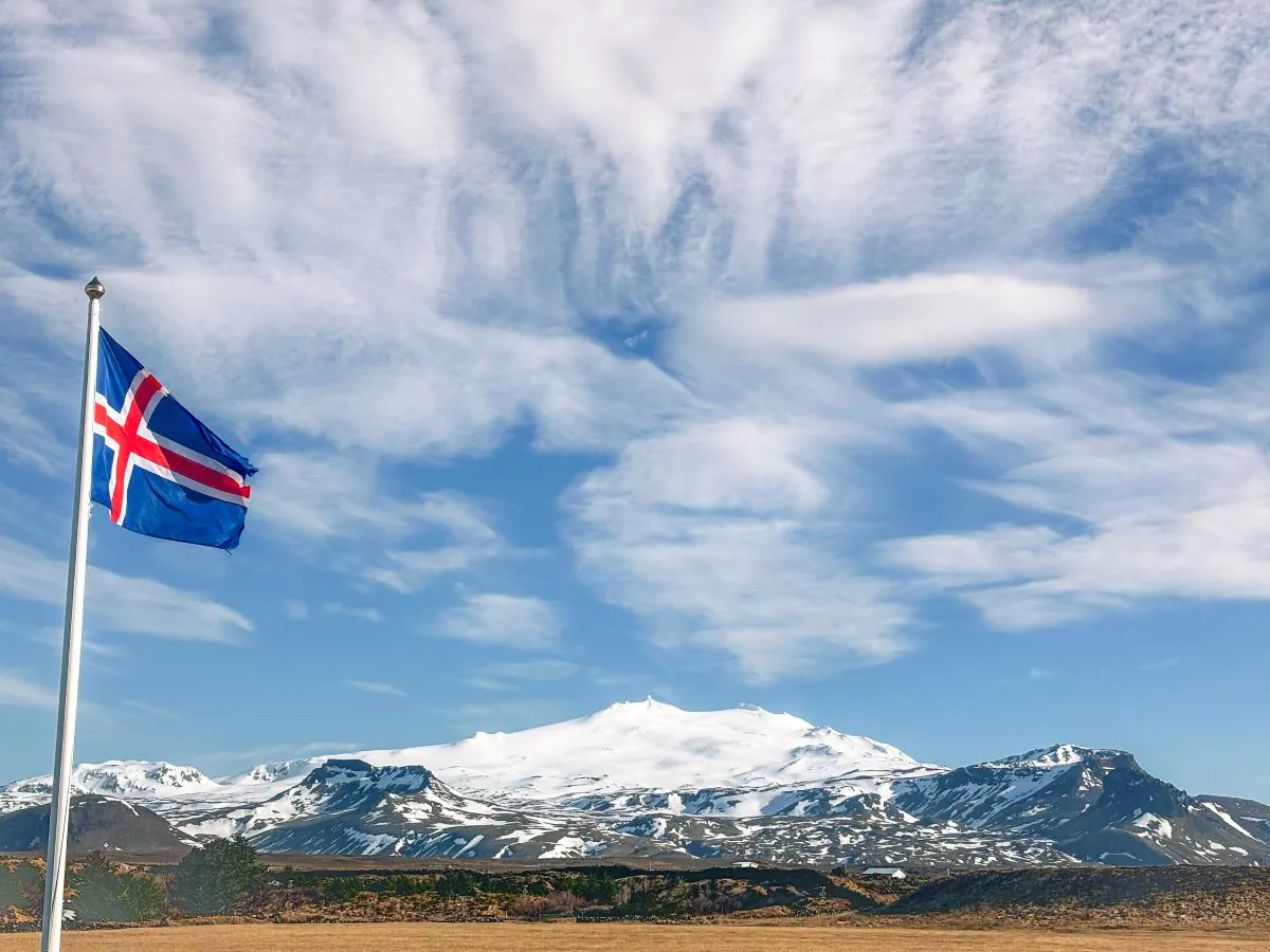 Icelandic flag and Snæfellsjökull glacier. Credit: Visit West