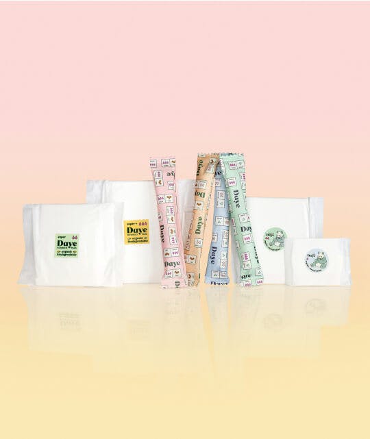 Mix of Daye's sustainable period care products containing CBD tampons and biodegradable pads