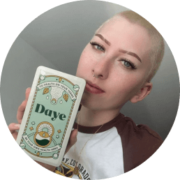 A woman holding organic Daye tampons 