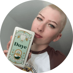 Photo of female holding Daye's tampon box