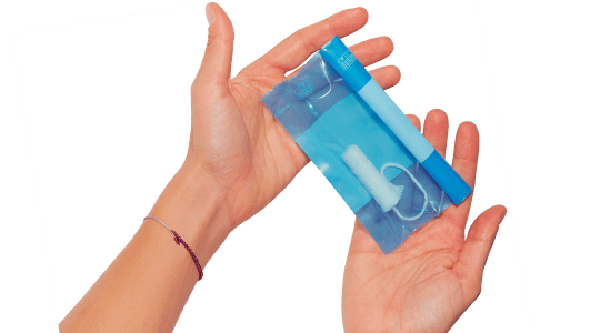 Hands holding Daye's at home vaginal microbiome self-testing kit