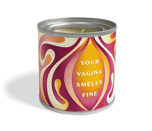 a photo of the your vagina smells fine candle which is housed in an aluminium tin with a sticker that is violet orange and cream  