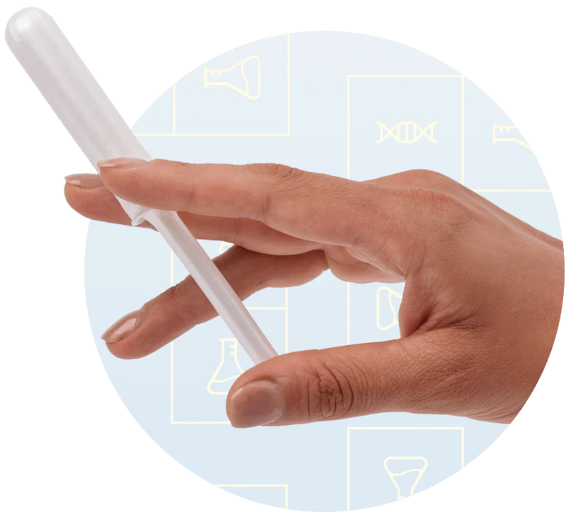 A hand holding Daye's non-invasive diagnostic tampon with a sugarcane coating