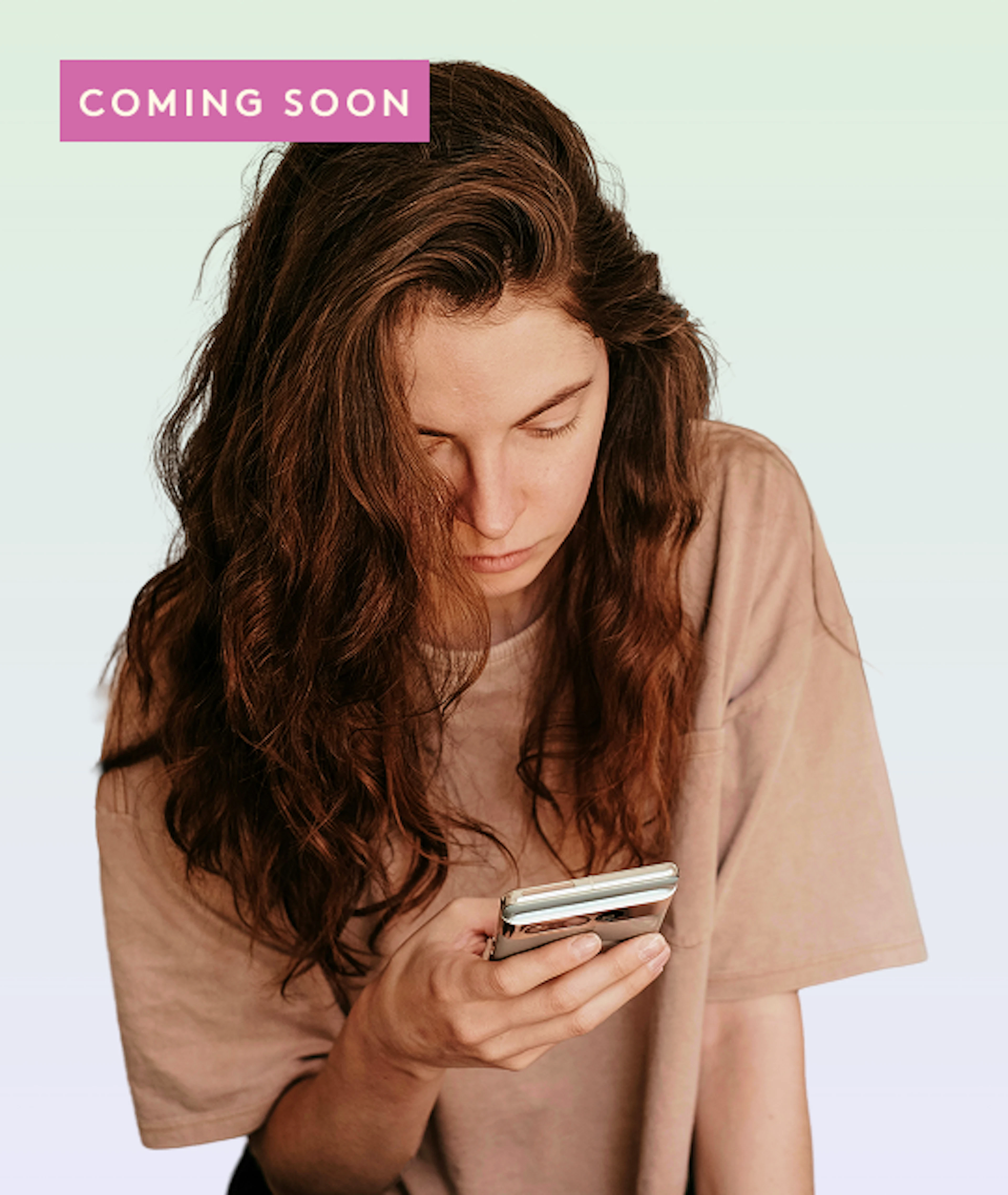 Woman looking at her phone, PMOS Assessment coming soon