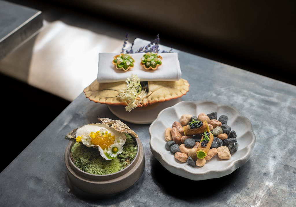 Table du restaurant Frenchie, labellisée 2 macarons Écotable