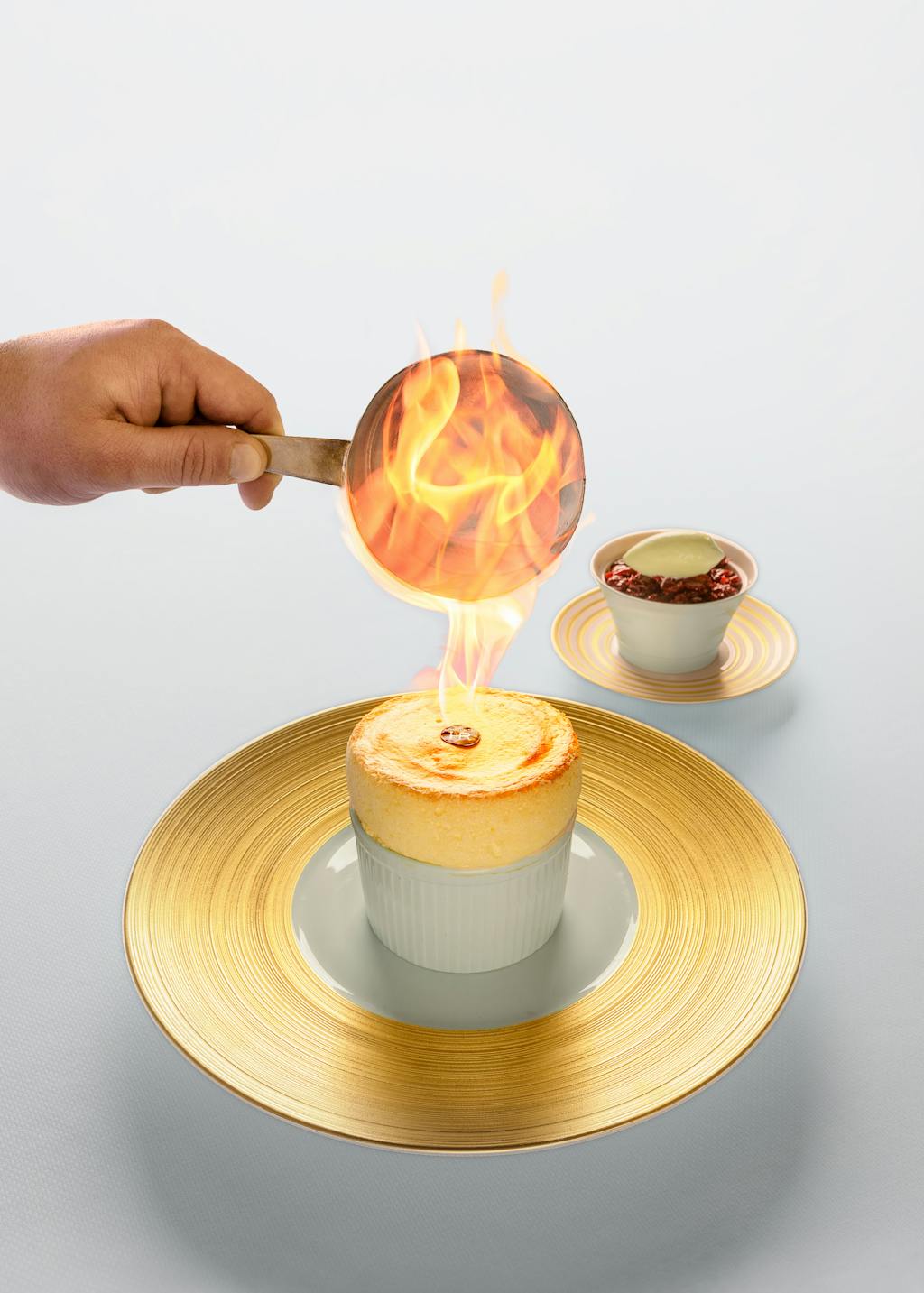 Soufflé flambé adu restaurant écoresponsable Les Fresques, labellisé 3 macarons Écotable