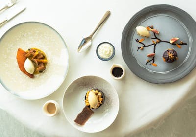 Table du restaurant Adour par l'École Alain Ducasse, labellisé 1 macaron Écotable