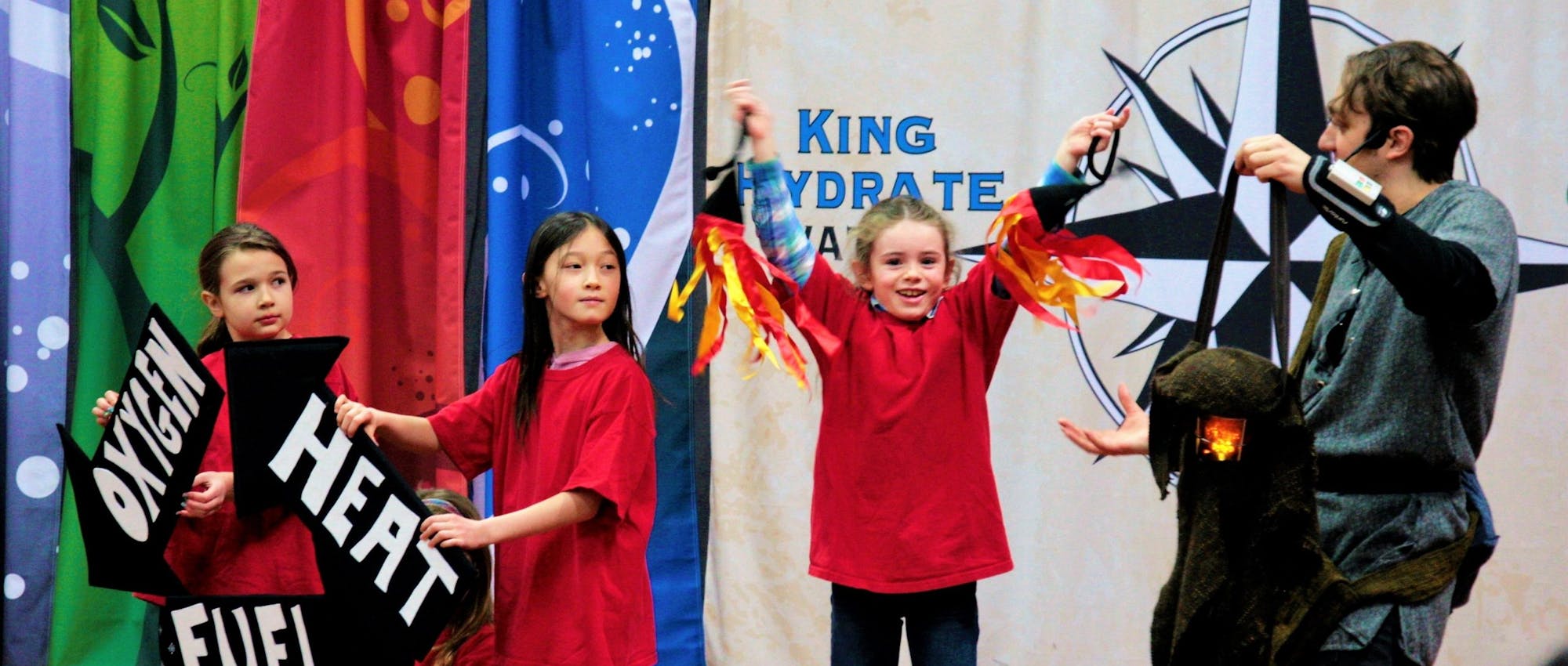 Children performing a play about climate change.