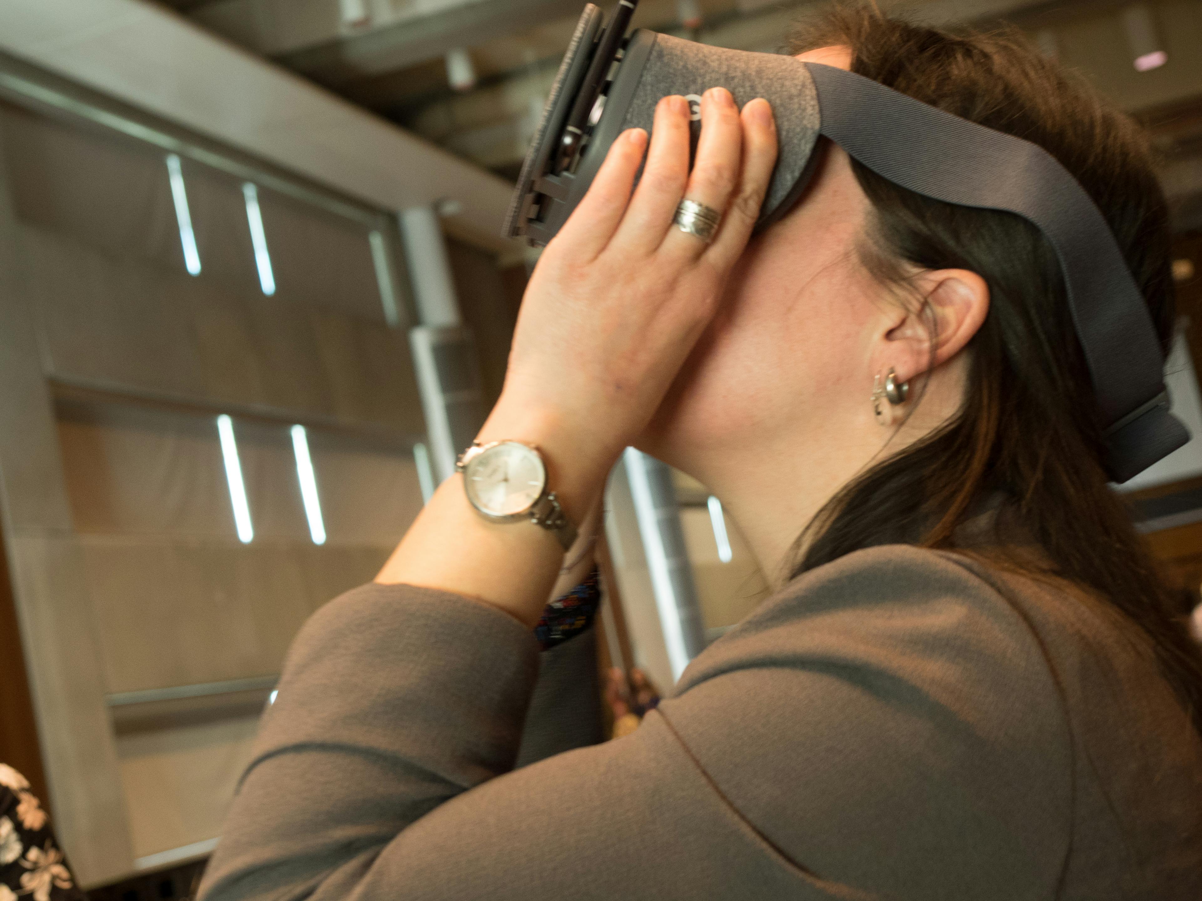 women using virtual reality goggles