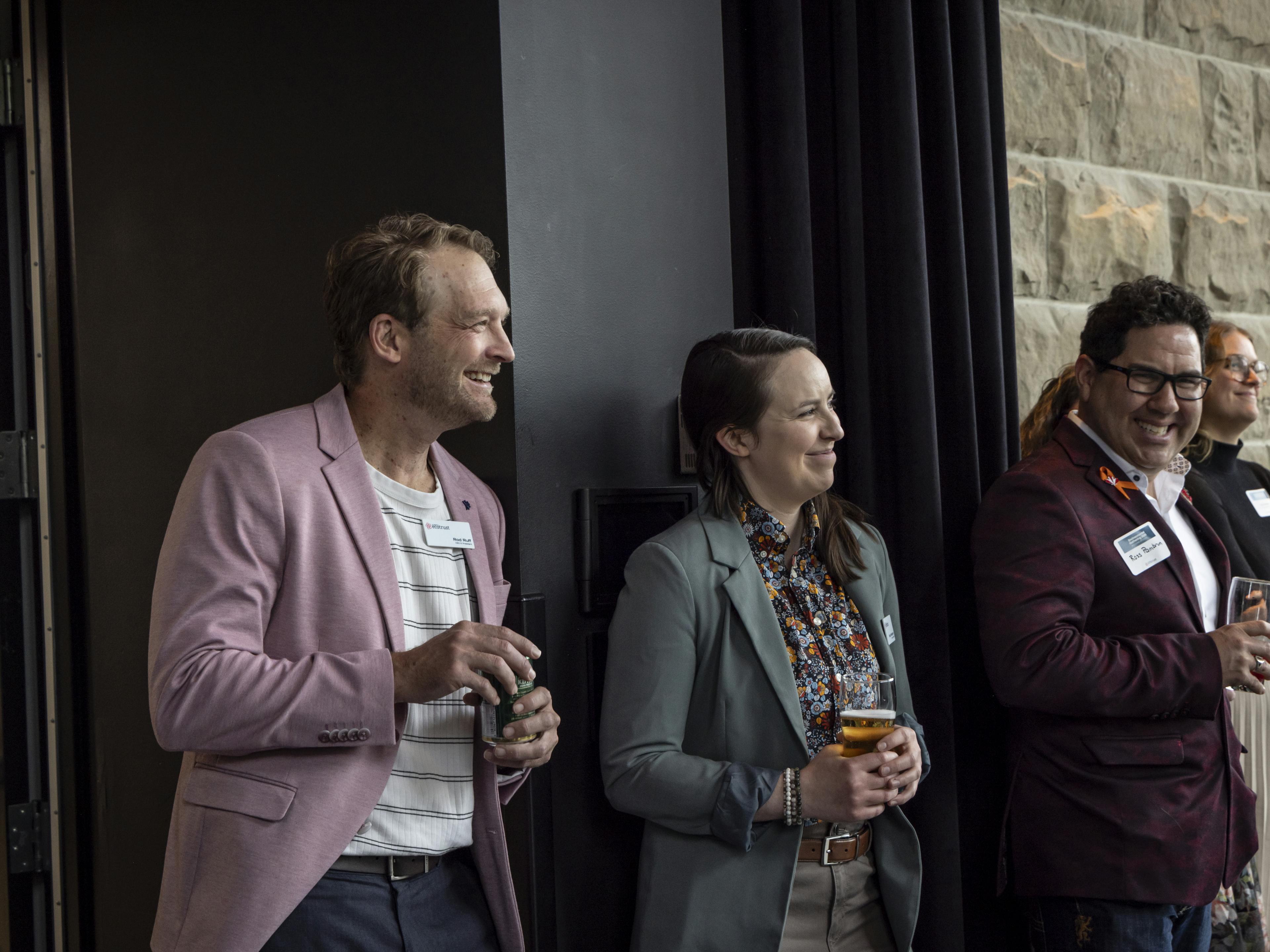 group standing and laughing