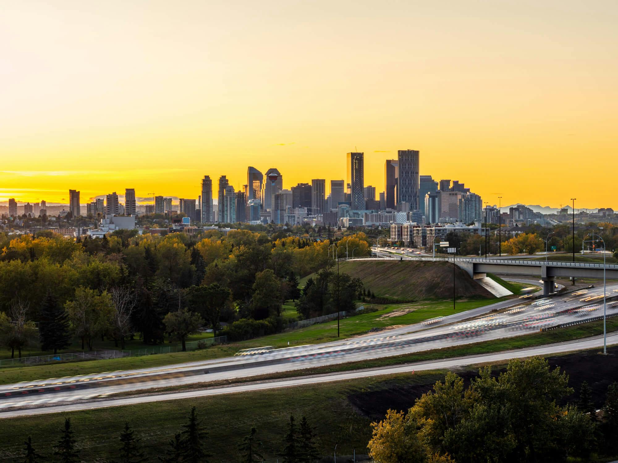 Calgary skyline against a yellow sky