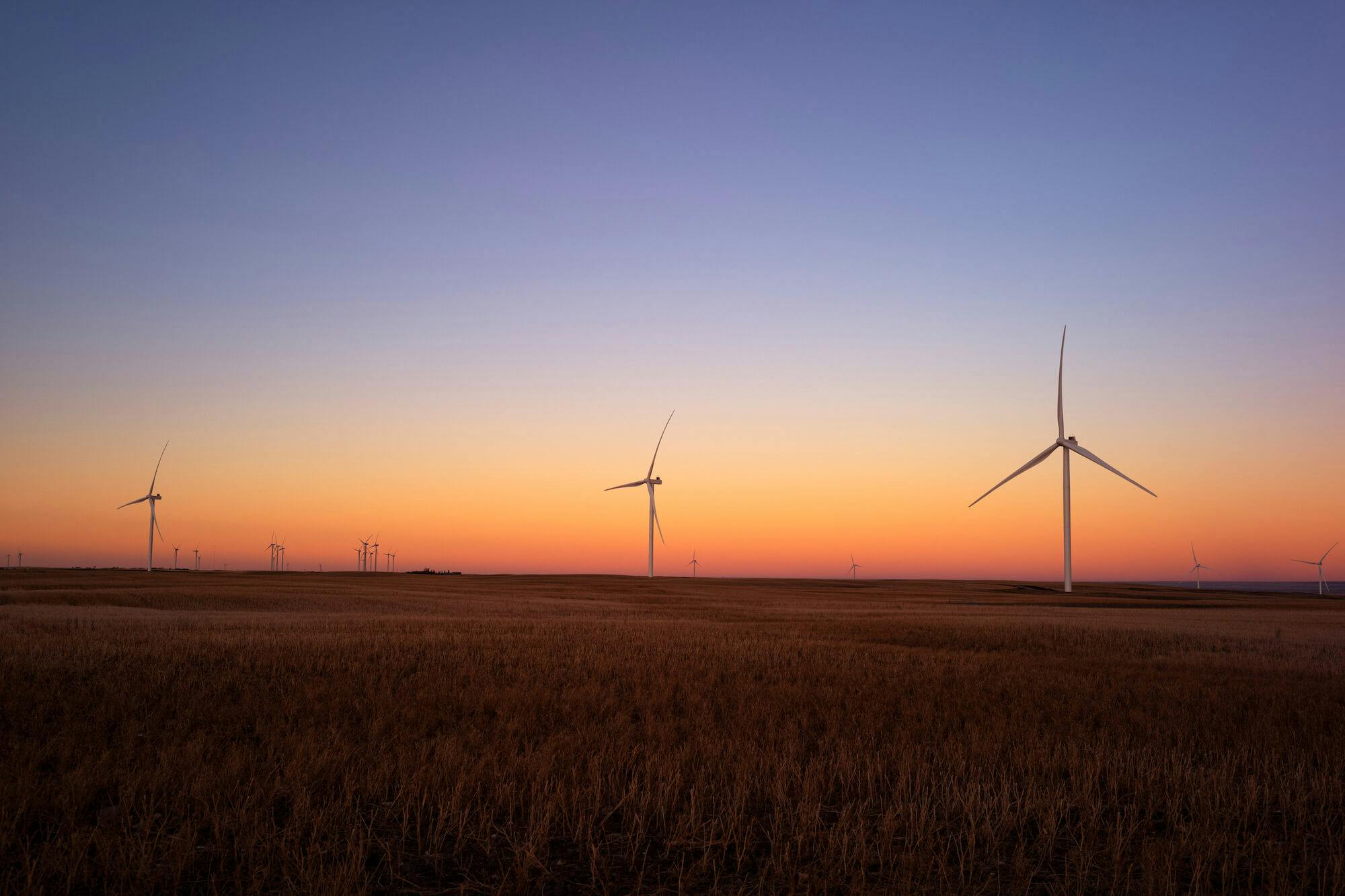 Wind turbines in a wide prairie field