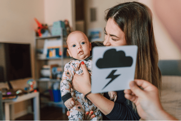 Rote learning example - baby with flashcard in front