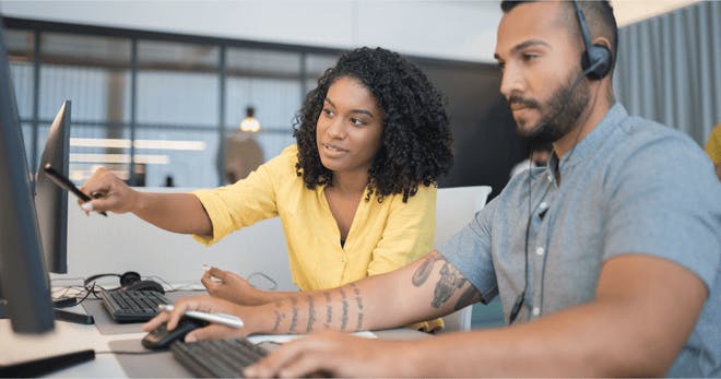 A trainer teaching an employee