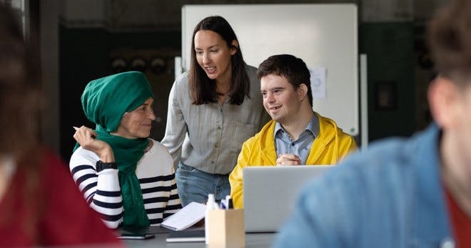 Three people displaying inclusive collaboration