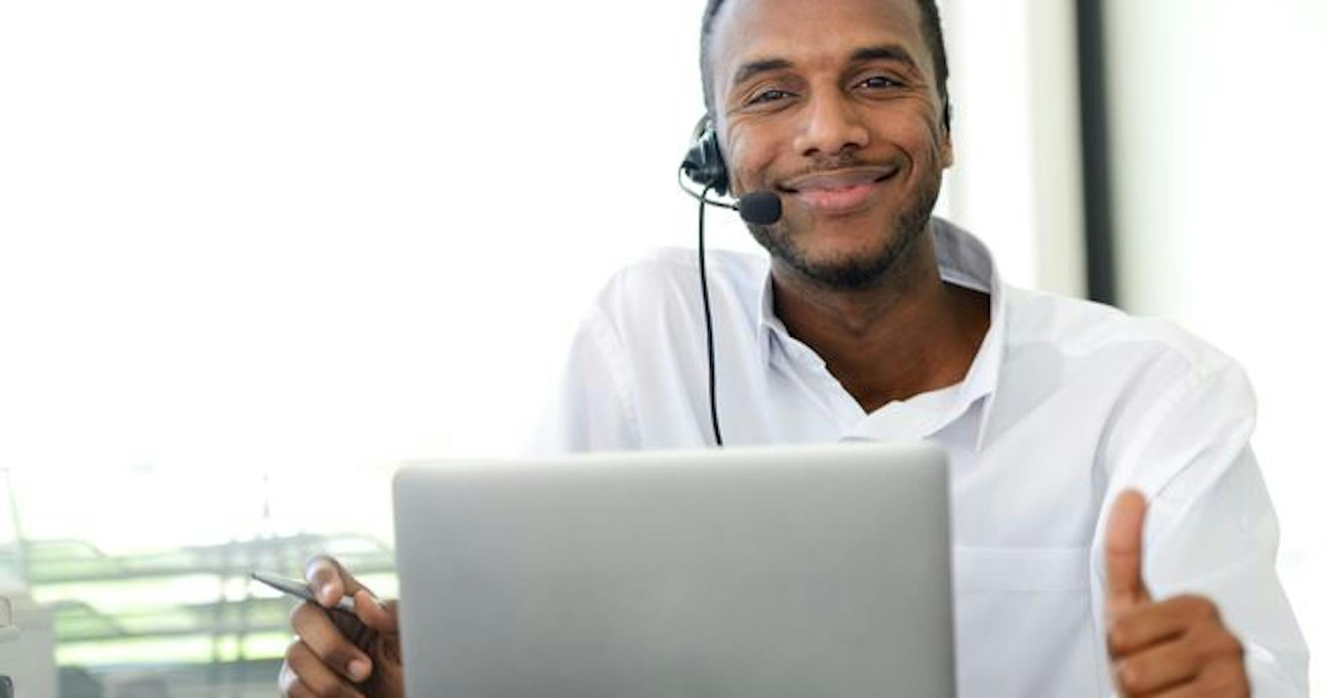 A man enrolled in a webinar class on his laptop