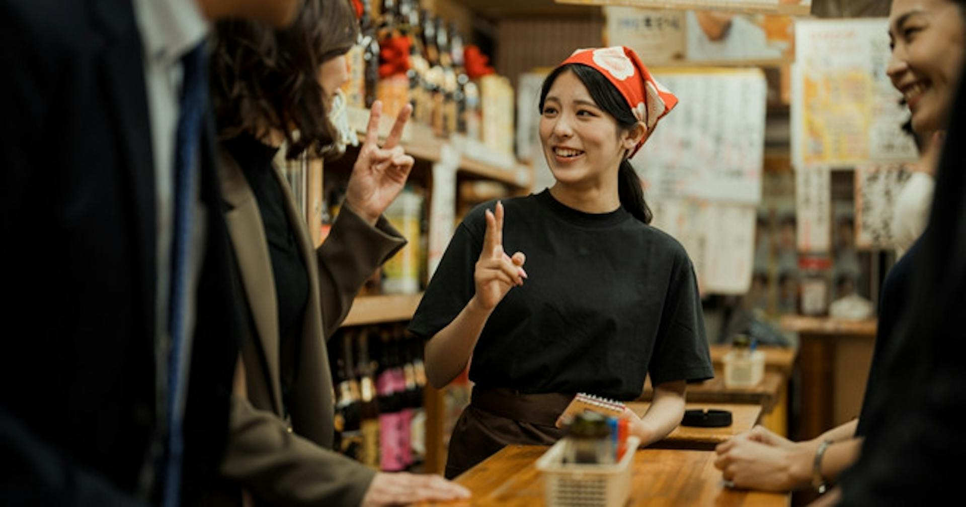 A store manager taking a customer's order