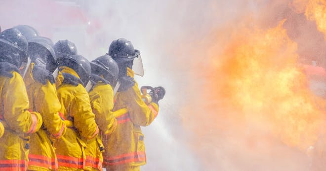 A team of firefighters putting out a fire